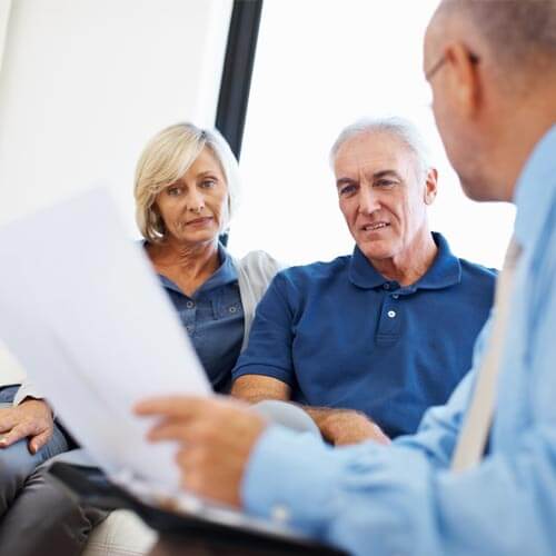 mature couple with a financial adviser